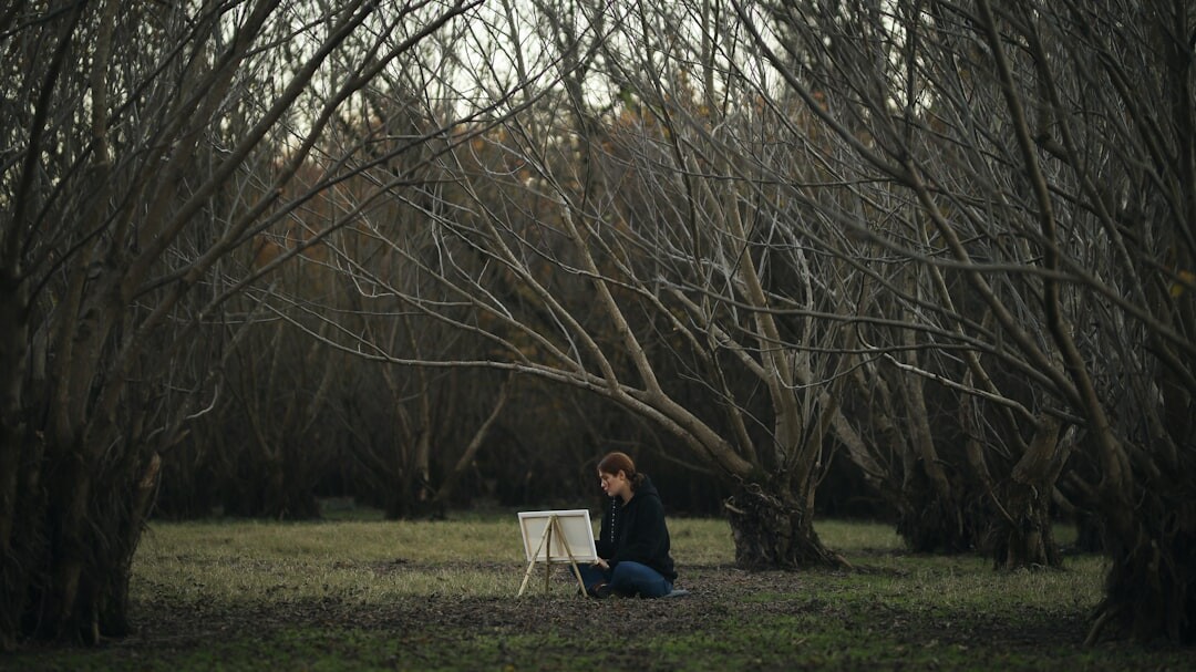 person journaling outdoors
