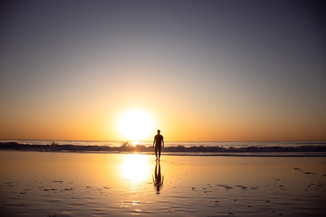 sunset reflection by the sea