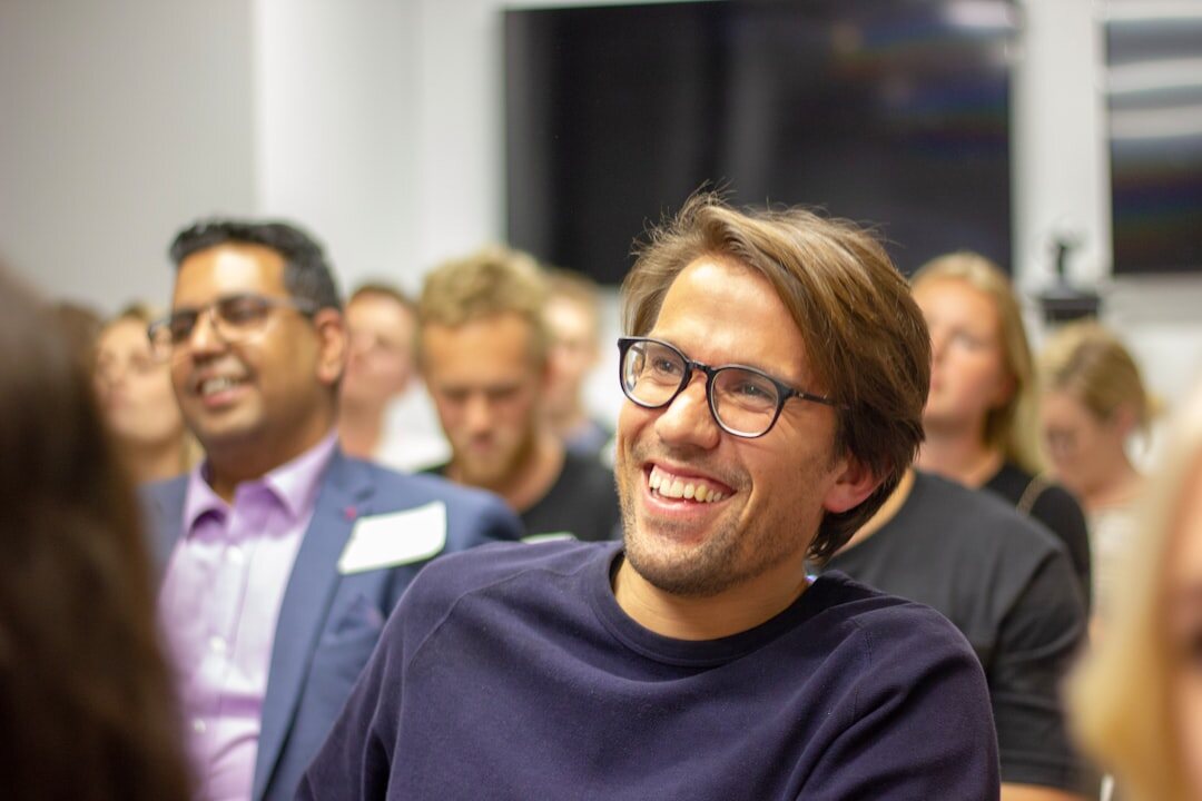 confident speaker smiling at audience